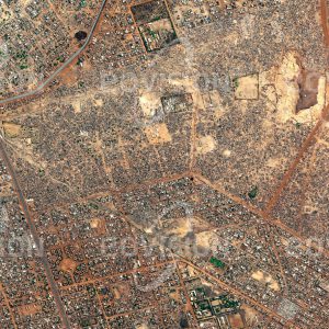 Das Satellitenbild "OUAGADOUGOU - Burkina Faso" ist dem Bildband "CITIES - Brennpunkte der Menschheit" entnommen. Bildbeschreibung: Die 1,6-Millionen-Einwohner-Stadt Ouagadougou in Burkina Faso ist eine der Städte mit dem weltweit höchsten Bevölkerungswachstum. Weite Teile von Ouagadougou bestehen aus „informellen Siedlungen“, die an die entwickelten Viertel anschließen und deren Bewohner weitgehend ohne Strom, fließendem Wasser und Kanalisation auskommen müssen.